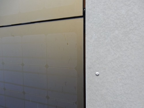 Detail eines goldfarbenen BIPV-Moduls © Baubüro in situ AG